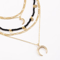 Temperament multi-layer rice bead moon pendant necklace mix and match sequins and contrast chain necklaces